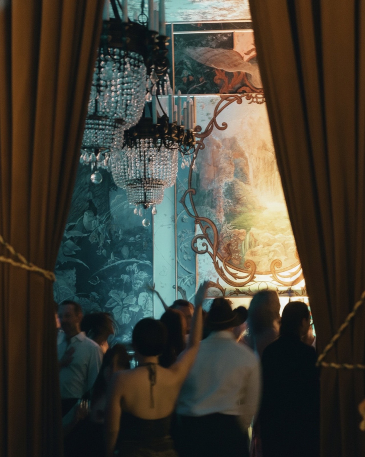 colored light through sheer curtains at an event build