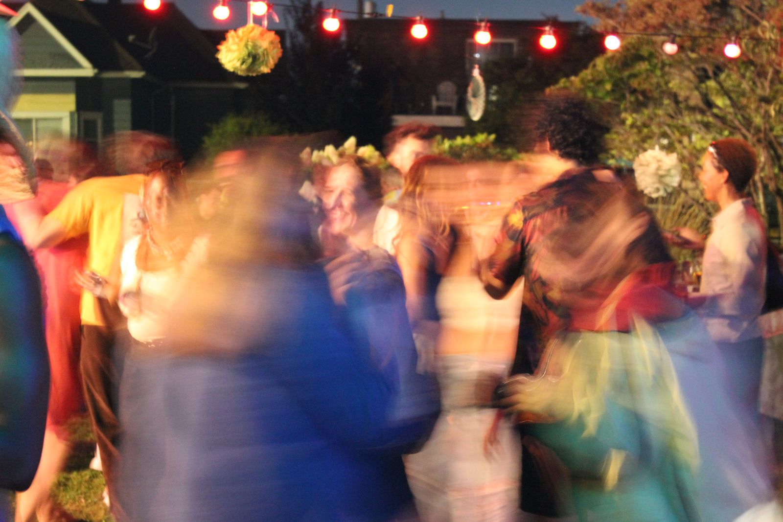 the dance floor at its peak, overexposed and blurred