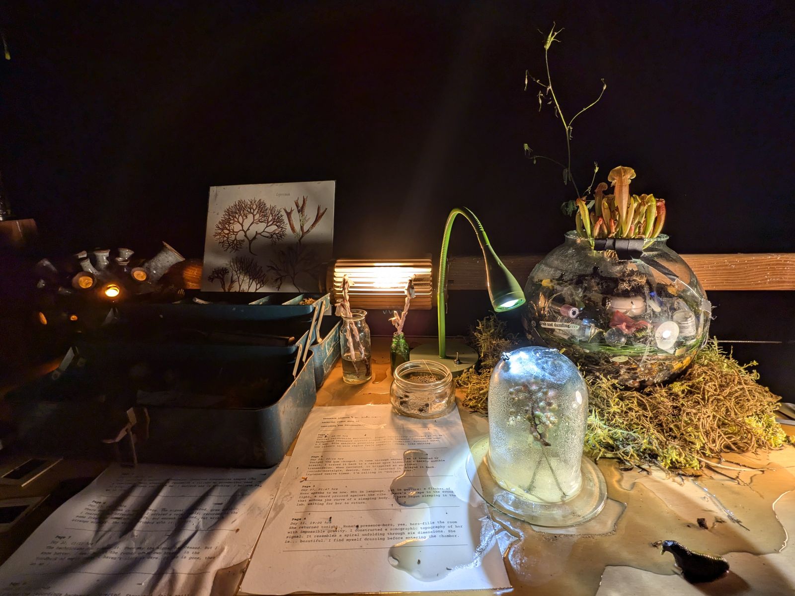 candlelit glass vessels on the night table