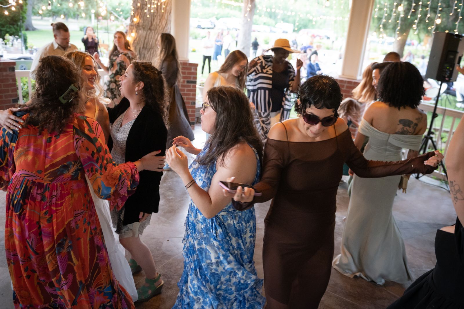 guests dancing in summer dresses