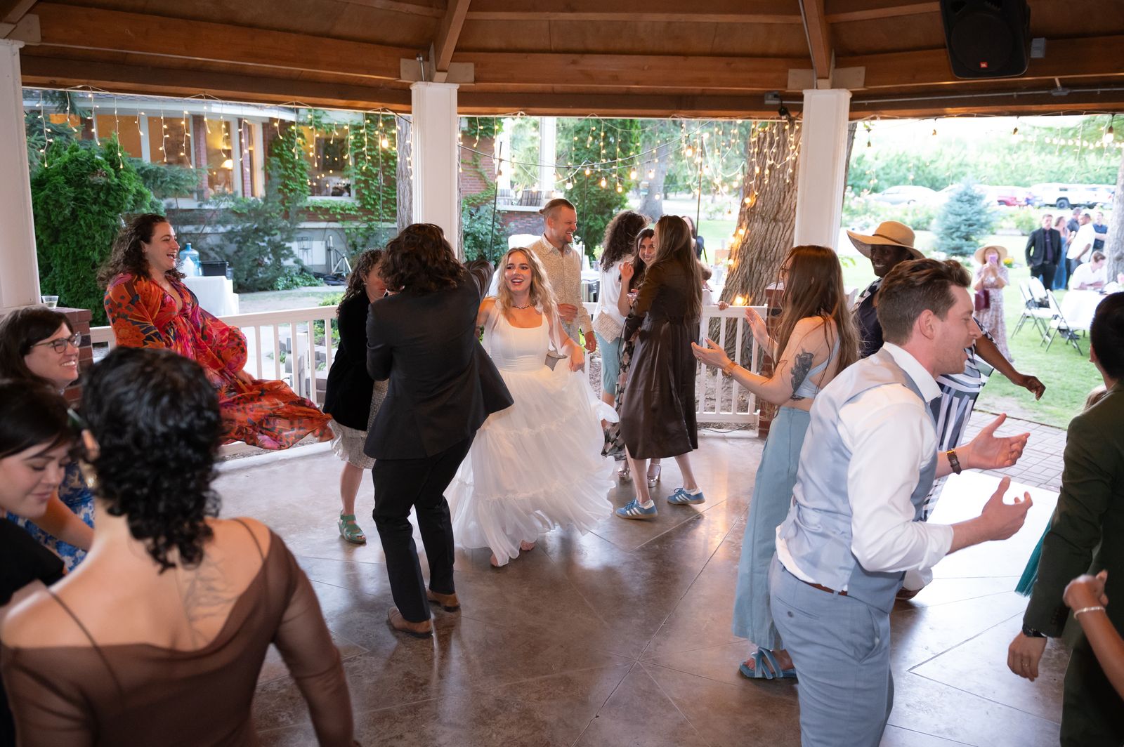 a wide view of the daytime dance floor and crowd