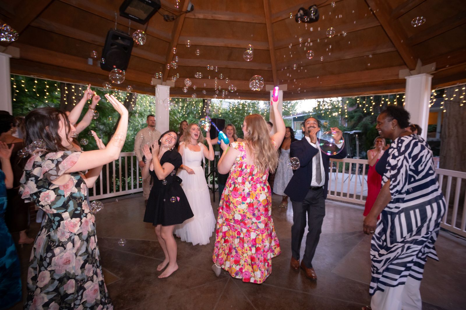dancing under string lights at the warm springs reception